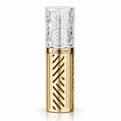 Clincom Golden Basis Cream cosmetic bottle with textured clear cap and gold finish