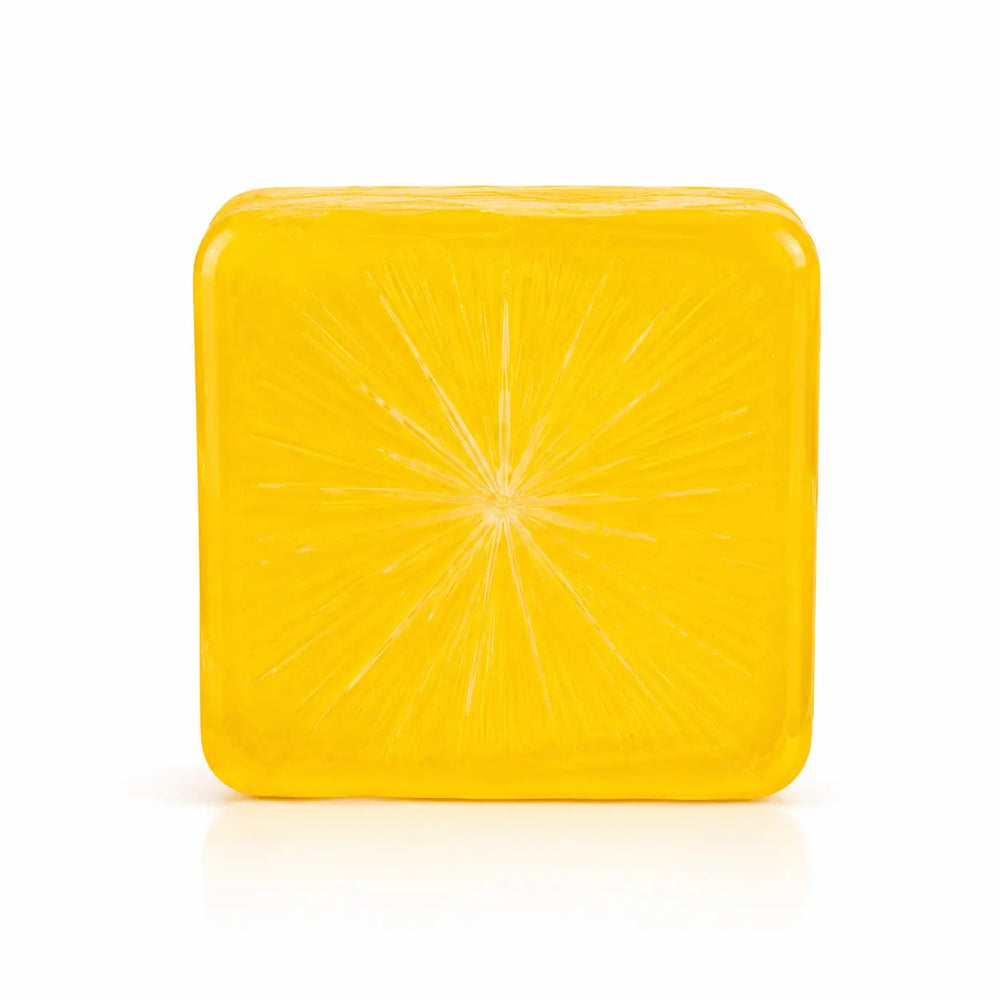 DIOMALA Honey Handmade Cold Soap bar with embossed citrus slice pattern on a white background