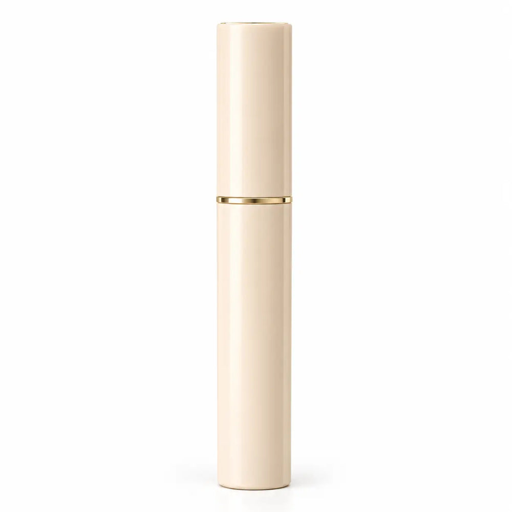 BCM O KOL slim cylindrical cosmetic tube in a glossy cream-beige finish with a thin metallic gold band on a white background.