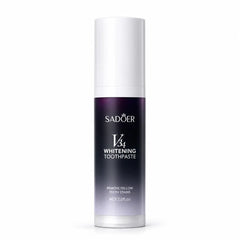 SADOER V34 Whitening Toothpaste in a cylindrical white and dark purple bottle with a gradient finish, shown on a white background.
