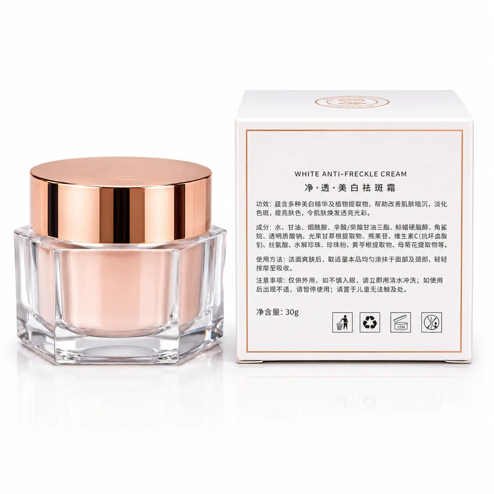 Back view of KUGE Whitening Freckle Cream 30g glass jar with rose gold lid and product box showing ingredients and usage instructions for reducing freckles, dark spots, and pigmentation.